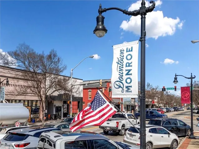 a front view of a building with garden