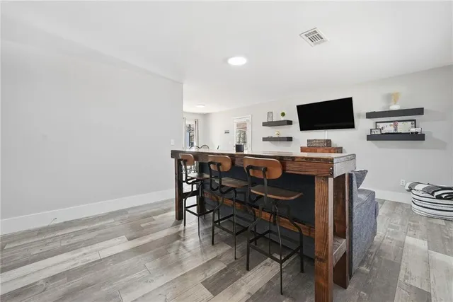 a view of a workspace with furniture