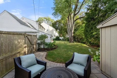 a view of a table and chairs in patio