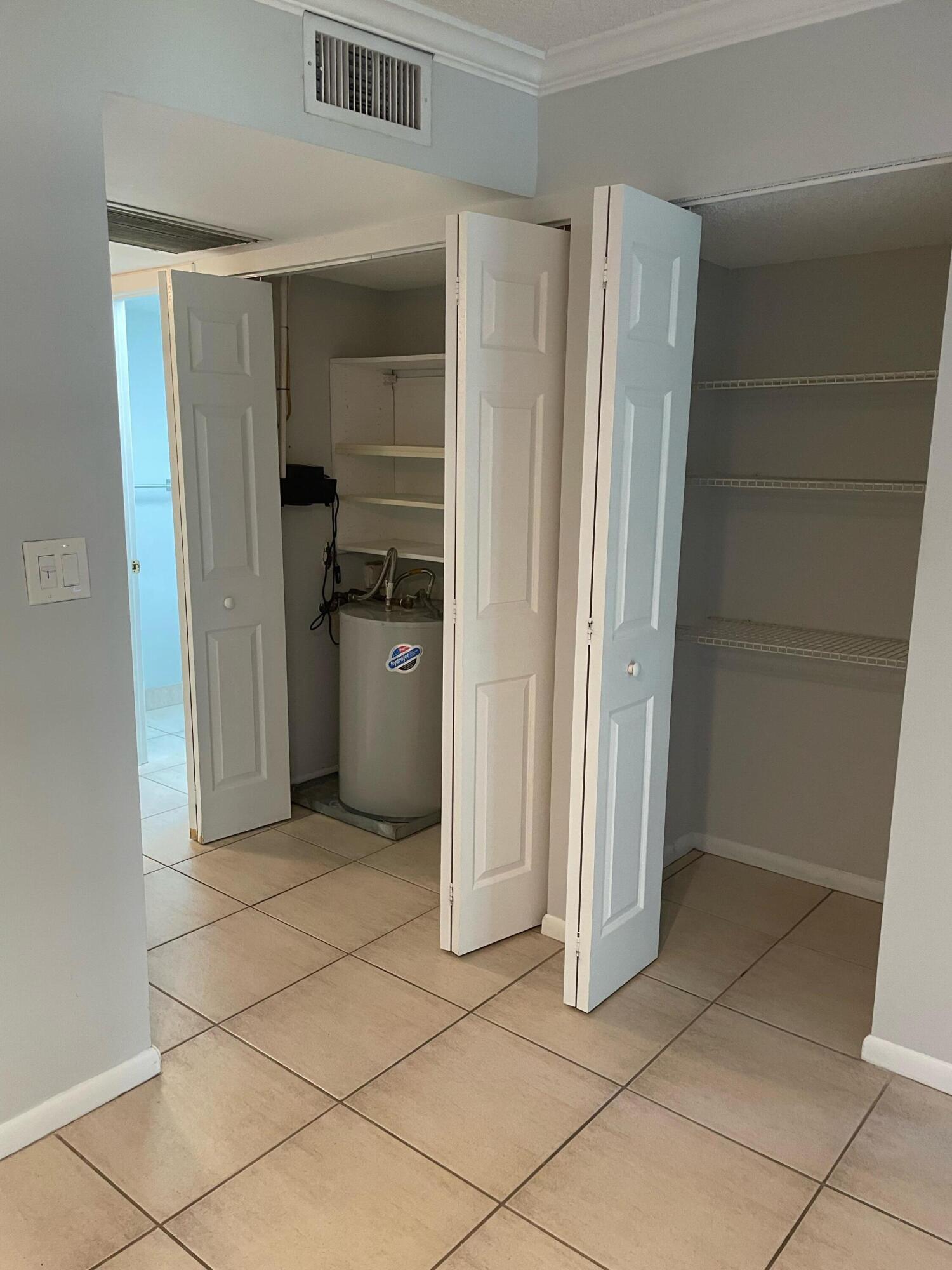 9440 Southwest 8th Street, Unit 217 Boca Raton, FL 33428 - Photo 5 of 28 Entry Closet