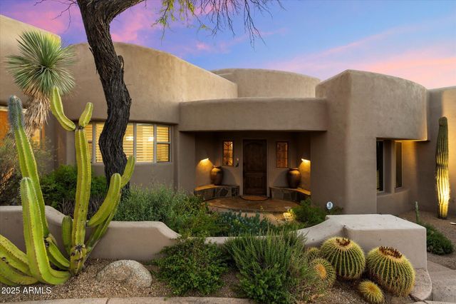 a front view of a house with balcony