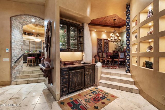 a view of living room kitchen and dining room