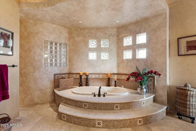 a dining room with table and chairs