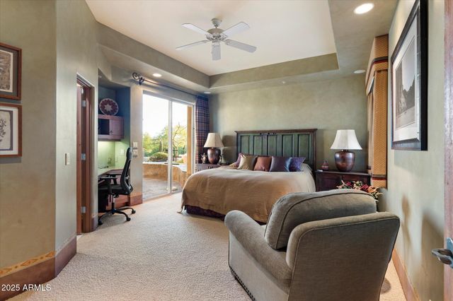 a bed room with a bed and a window