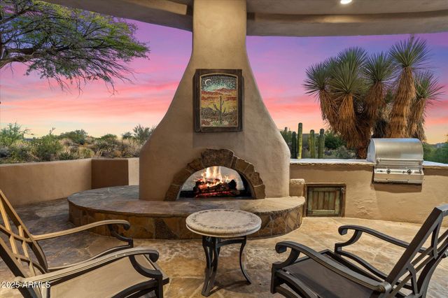 a view of a chairs and table in the terrace