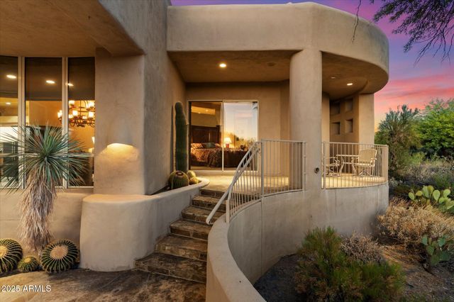 a view of a living room and entryway