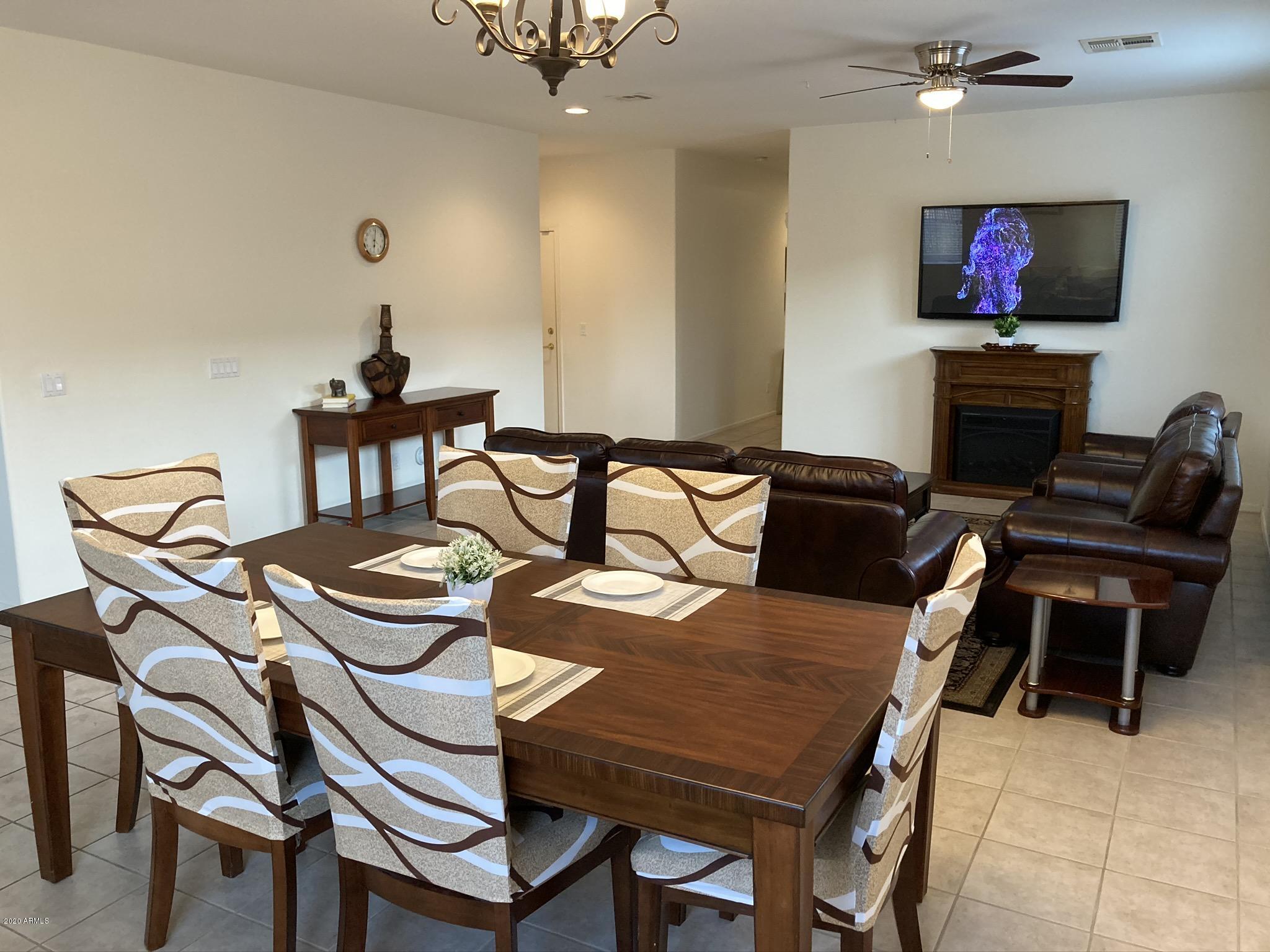 7342 West Carter Road Laveen, AZ 85339 - Photo 7 of 18 a view of a dining room with furniture