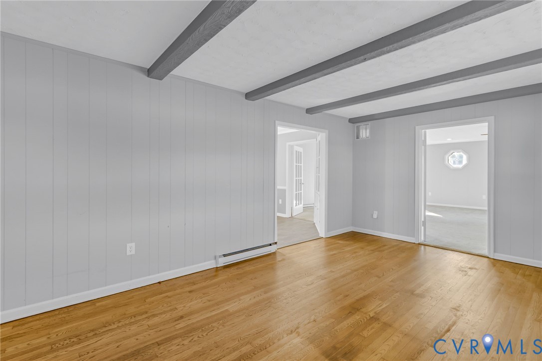 1928 Lake Road Lottsburg, VA 22511 - Photo 2 of 47 a view of an empty room and wooden floor