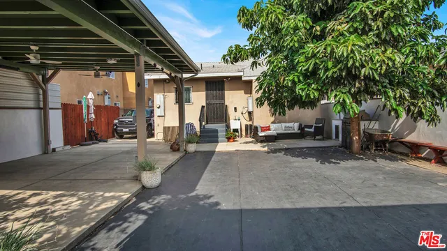 a view of a house with a patio