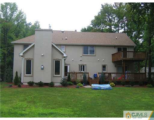 16 Parker Road, Unit NONE Edison, NJ 08820 - Photo 8 of 8 a house view with a garden space
