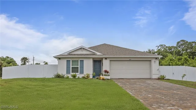 front view of a house with a yard