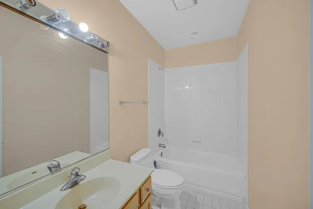 a room with a chair and couch