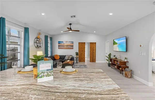 a view of living room filled with furniture