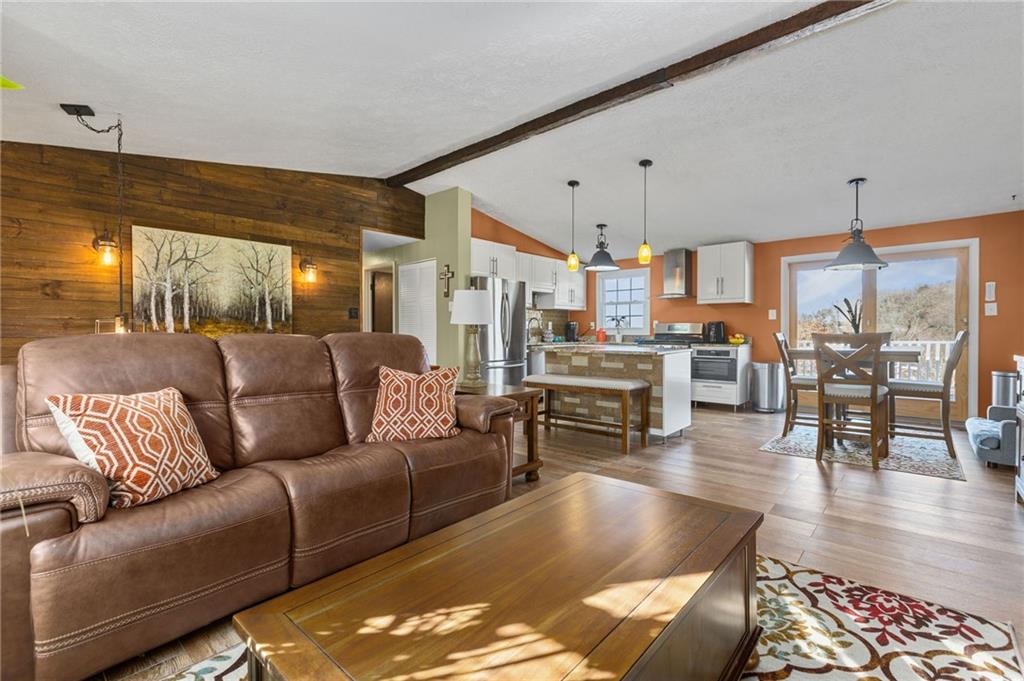 110 Tory Road Coraopolis, PA 15108 - Photo 3 of 19 a living room with furniture kitchen view and a wooden floor
