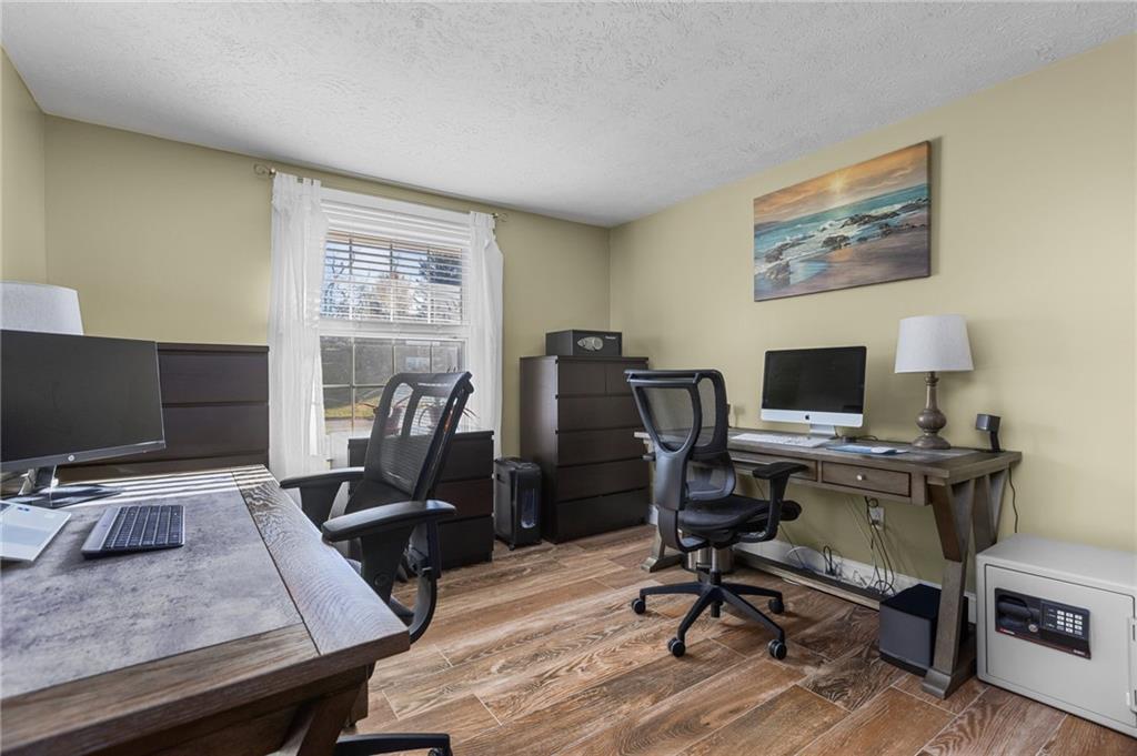 110 Tory Road Coraopolis, PA 15108 - Photo 9 of 19 a view of a workspace with furniture and a window