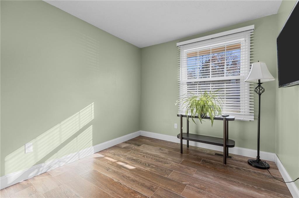 110 Tory Road Coraopolis, PA 15108 - Photo 10 of 19 a view of a room with wooden floor and a window