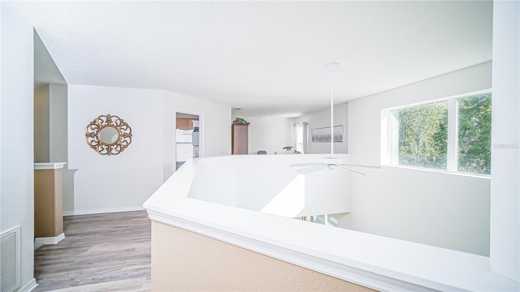 2528 Dharma Circle Kissimmee, FL 34746 - Photo 14 of 46 a white bath tub sitting next to a window