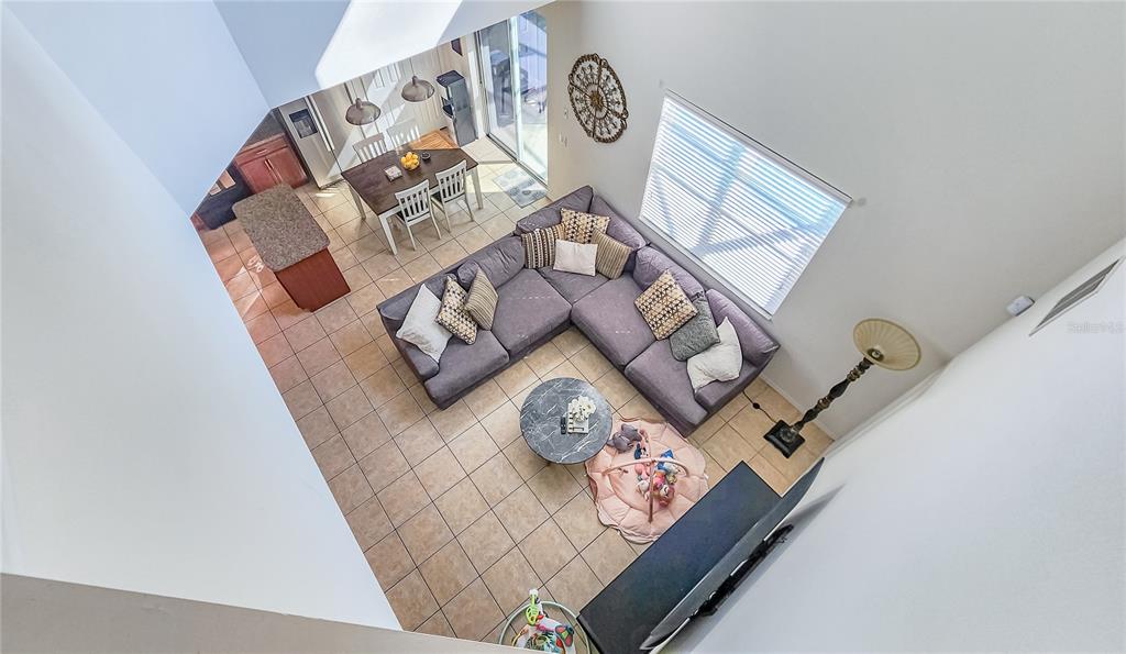 2528 Dharma Circle Kissimmee, FL 34746 - Photo 4 of 46 a view of living room with furniture and rug