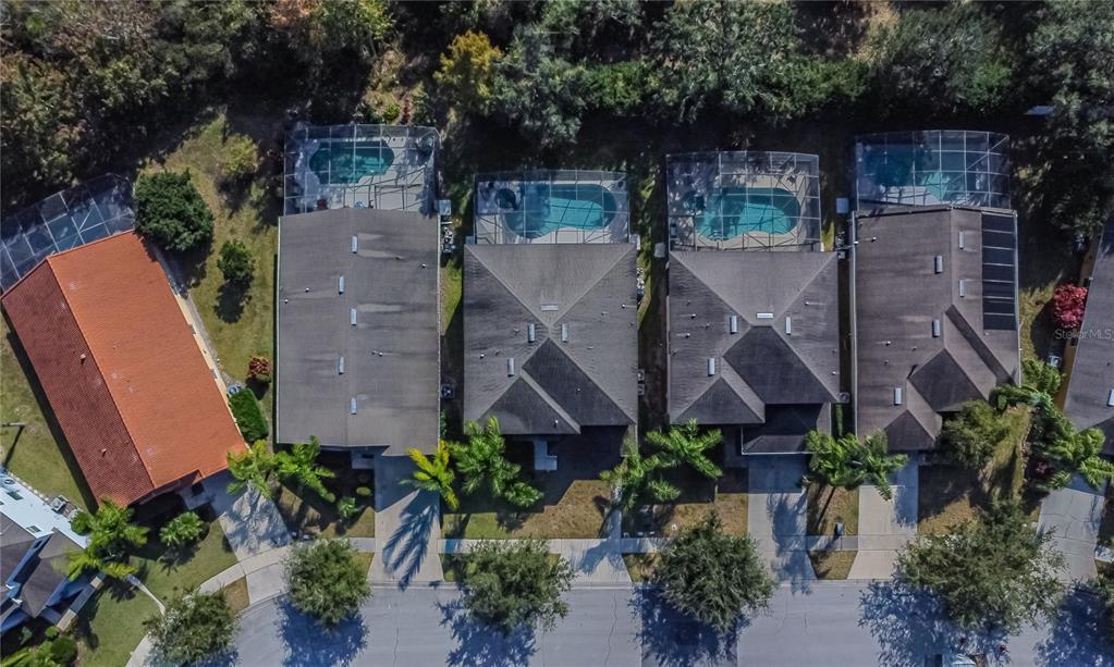 2528 Dharma Circle Kissimmee, FL 34746 - Photo 41 of 46 an aerial view of a house with garden space and a street view