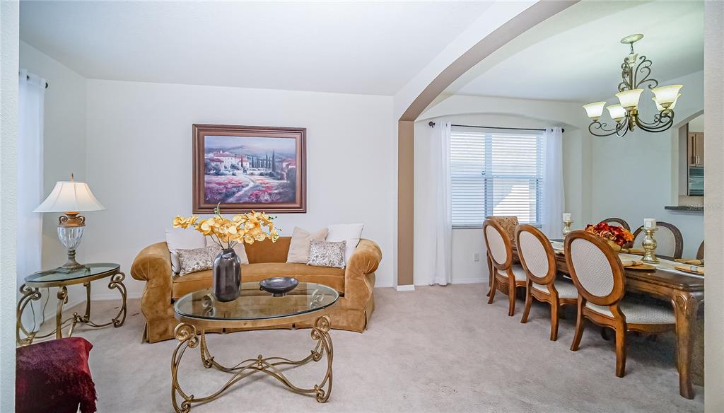 2528 Dharma Circle Kissimmee, FL 34746 - Photo 7 of 46 a dining room with furniture and window