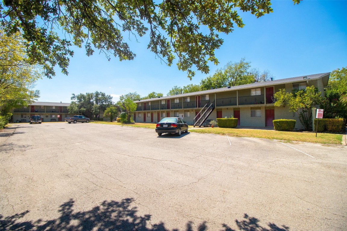 806 East 13th Street, Unit 105 Georgetown, TX 78626 - Photo 1 of 1 a view of outdoor space with swimming pool and furniture