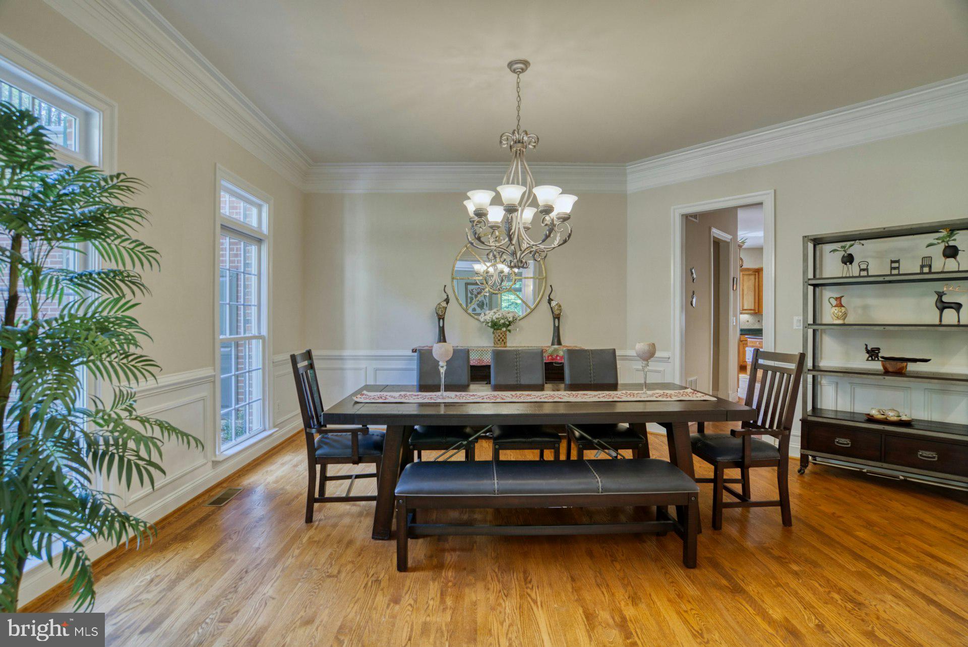 10300 Hampton Road Fairfax Station, VA 22039 - Photo 14 of 89 a view of a dining room with furniture wooden floor and chandelier