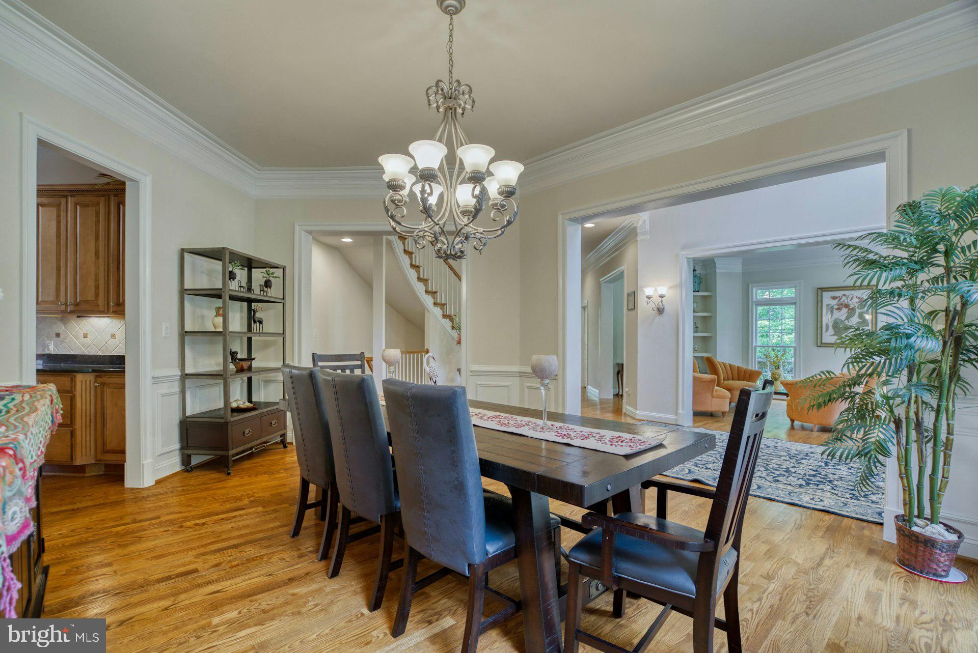 10300 Hampton Road Fairfax Station, VA 22039 - Photo 16 of 89 a view of a dining room with furniture and wooden floor