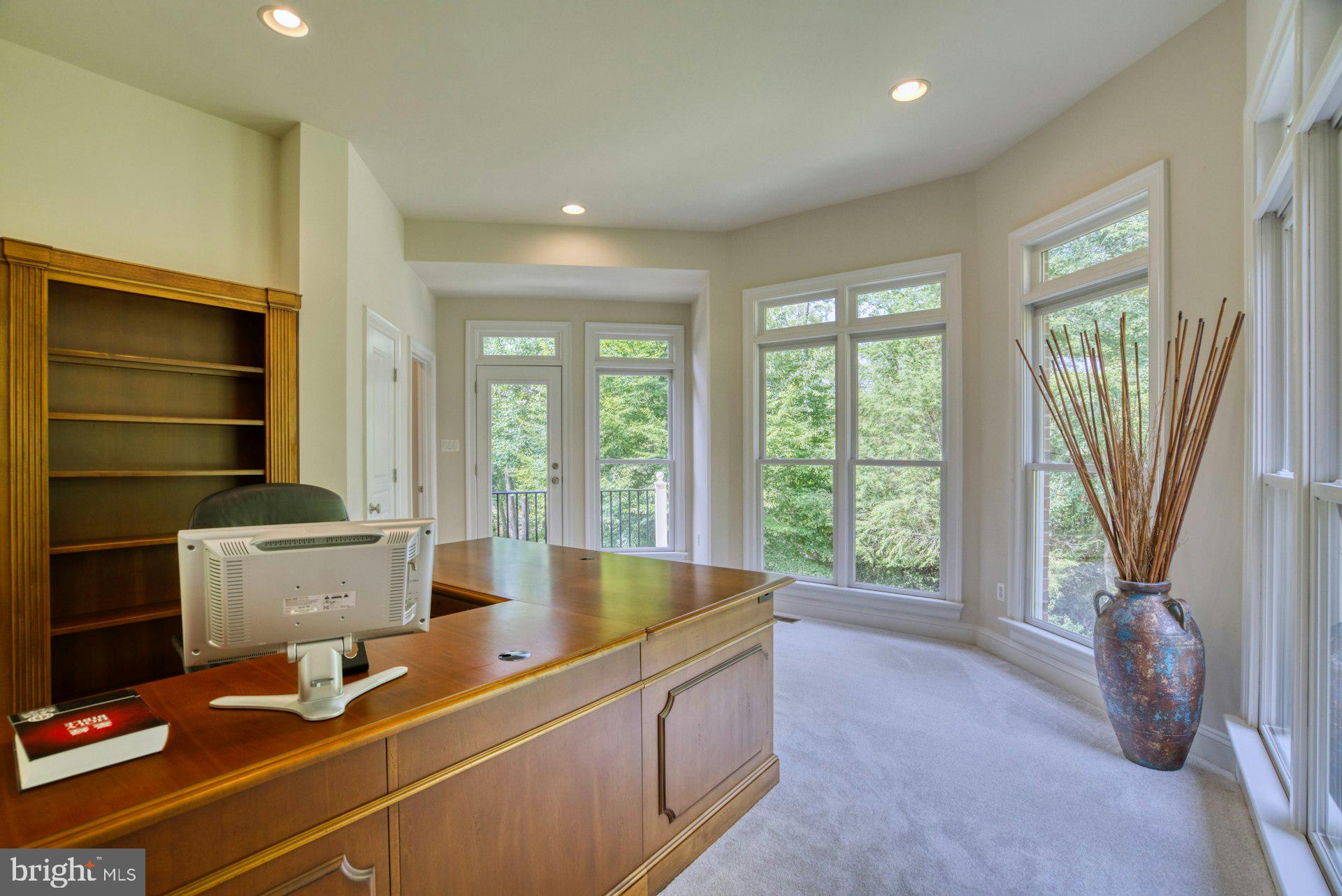 10300 Hampton Road Fairfax Station, VA 22039 - Photo 30 of 89 a room with furniture and a window