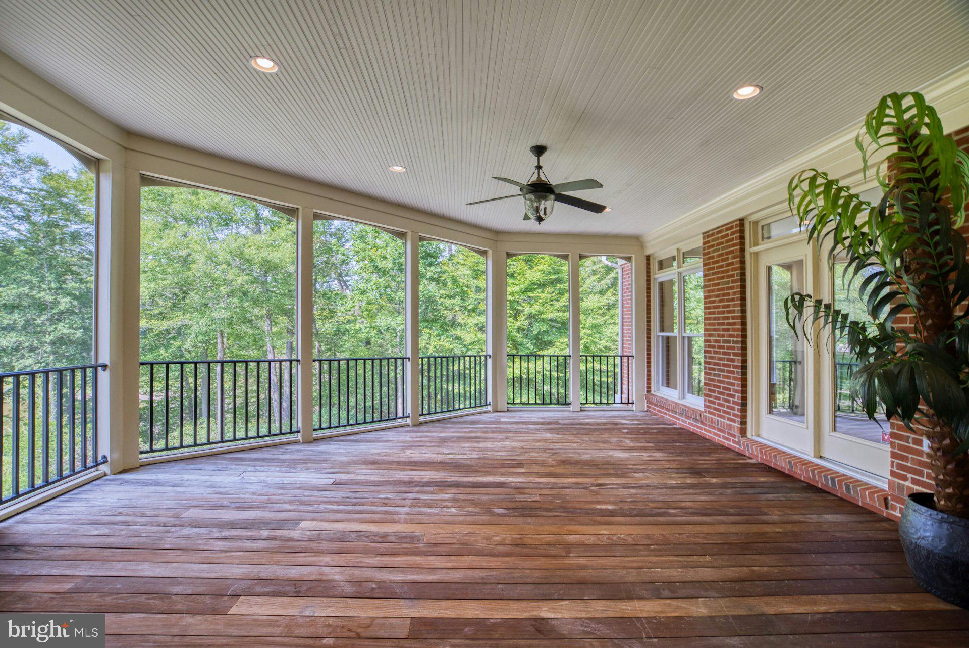 10300 Hampton Road Fairfax Station, VA 22039 - Photo 34 of 89 a view of a room with balcony and wooden floor