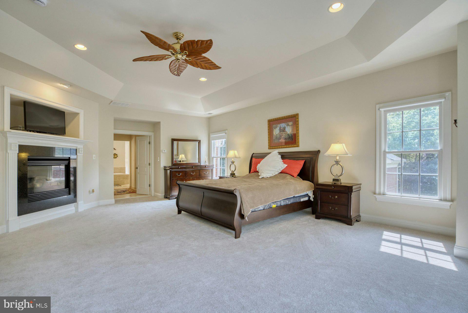 10300 Hampton Road Fairfax Station, VA 22039 - Photo 37 of 89 a bed room with a bed and a television