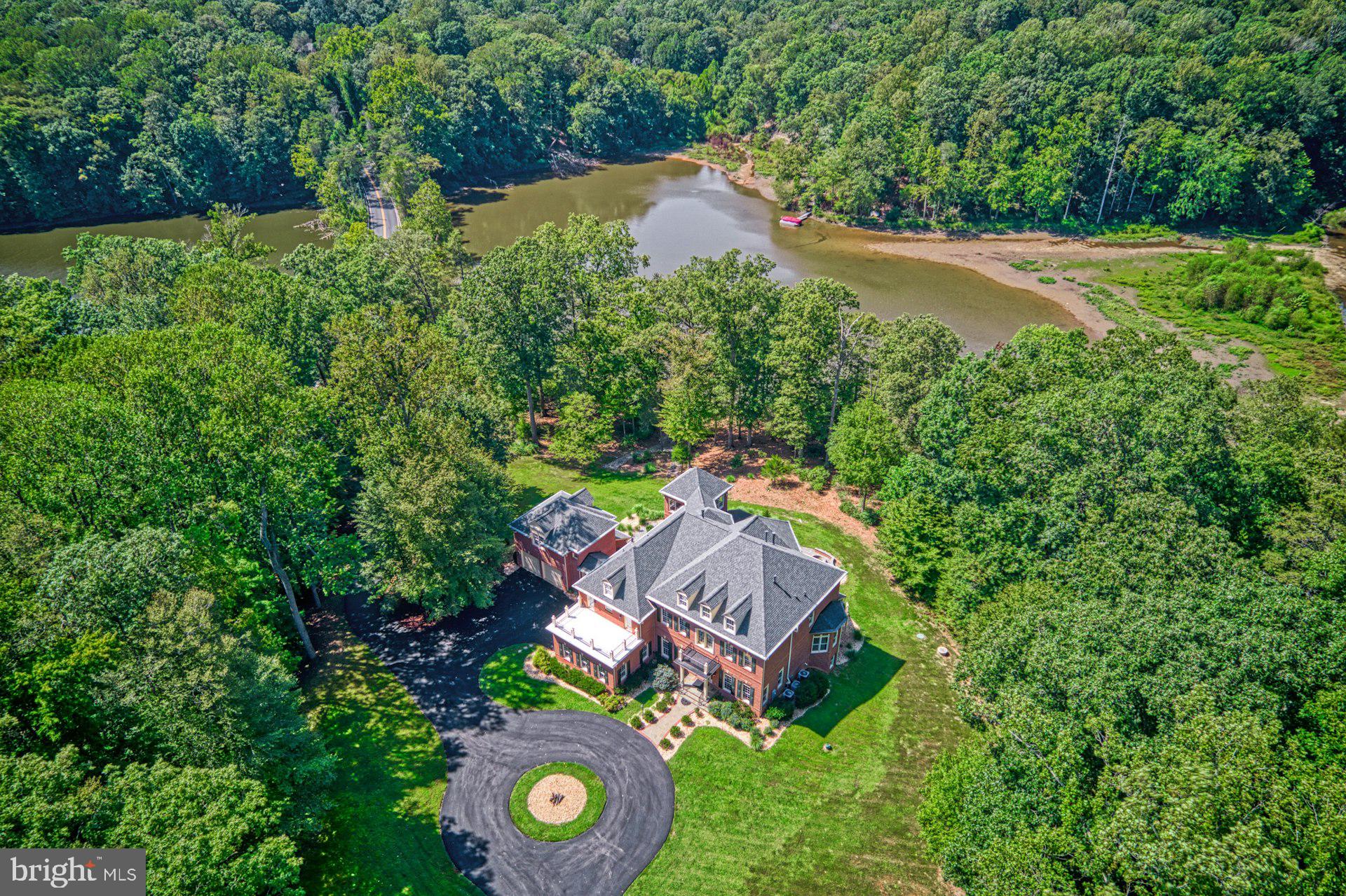 10300 Hampton Road Fairfax Station, VA 22039 - Photo 5 of 89 a view of an house with a yard