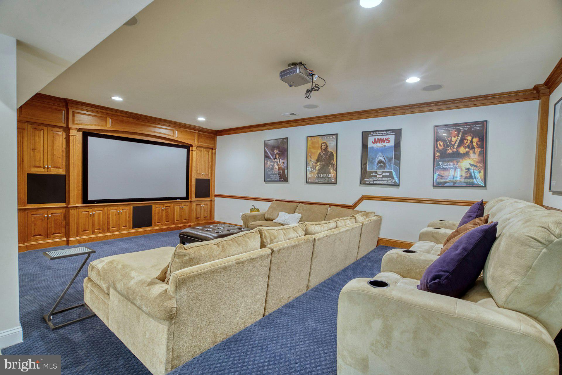 10300 Hampton Road Fairfax Station, VA 22039 - Photo 57 of 89 a living room with furniture and a flat screen tv