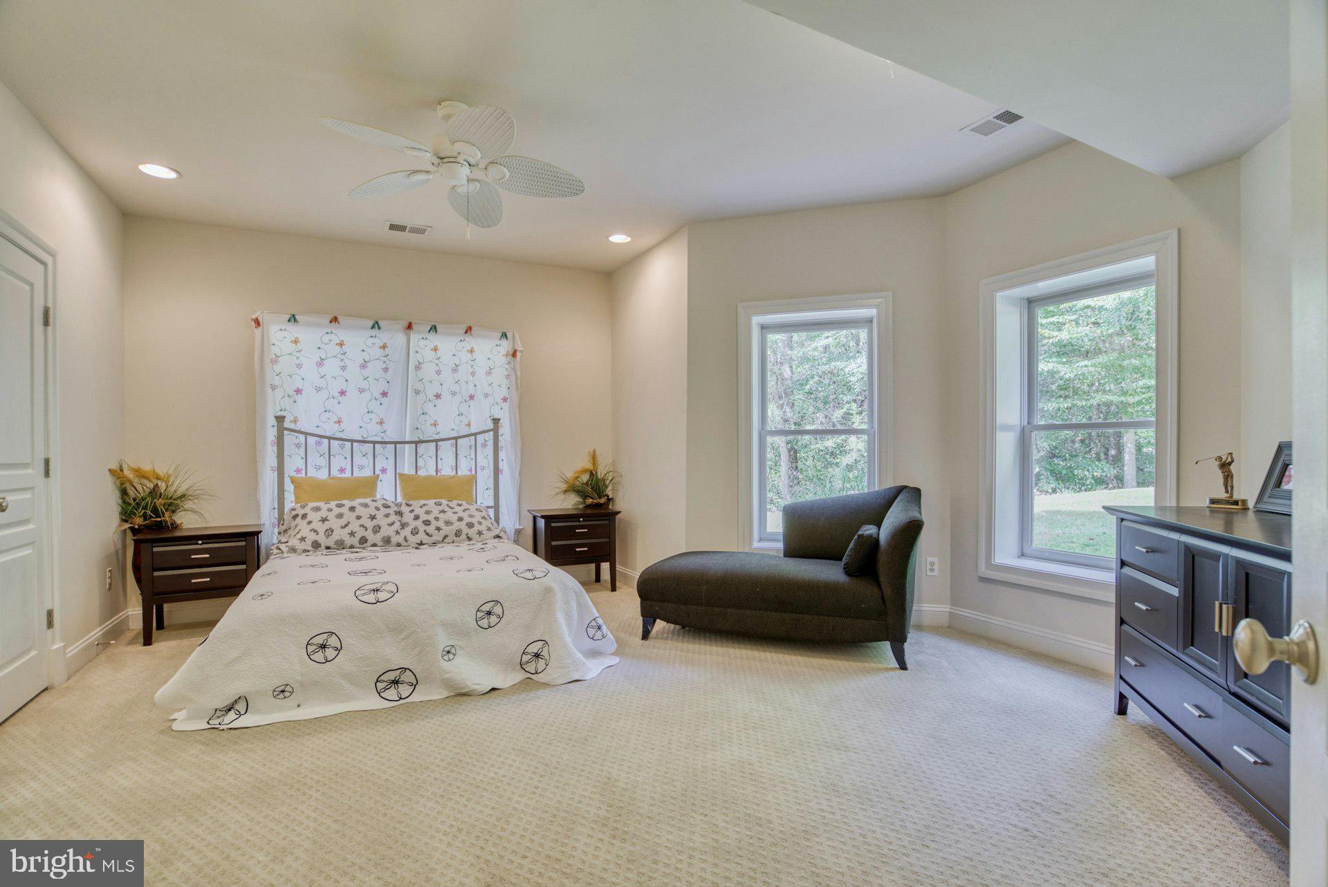 10300 Hampton Road Fairfax Station, VA 22039 - Photo 65 of 89 a bedroom with a bed and furniture