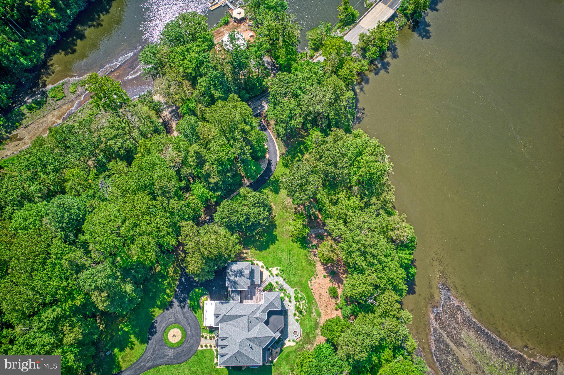 10300 Hampton Road Fairfax Station, VA 22039 - Photo 84 of 89 an aerial view of a house with a yard and garden in the back