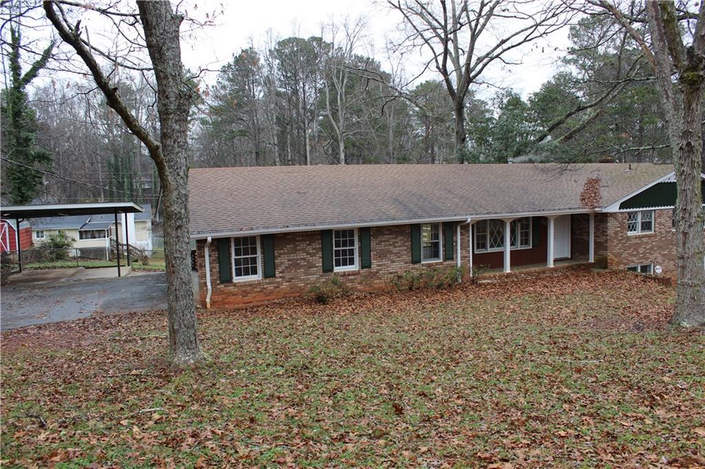 480 Smyrna Powder Springs Road Southwest Marietta, GA 30060 - Photo 1 of 1 front view of a house with a yard
