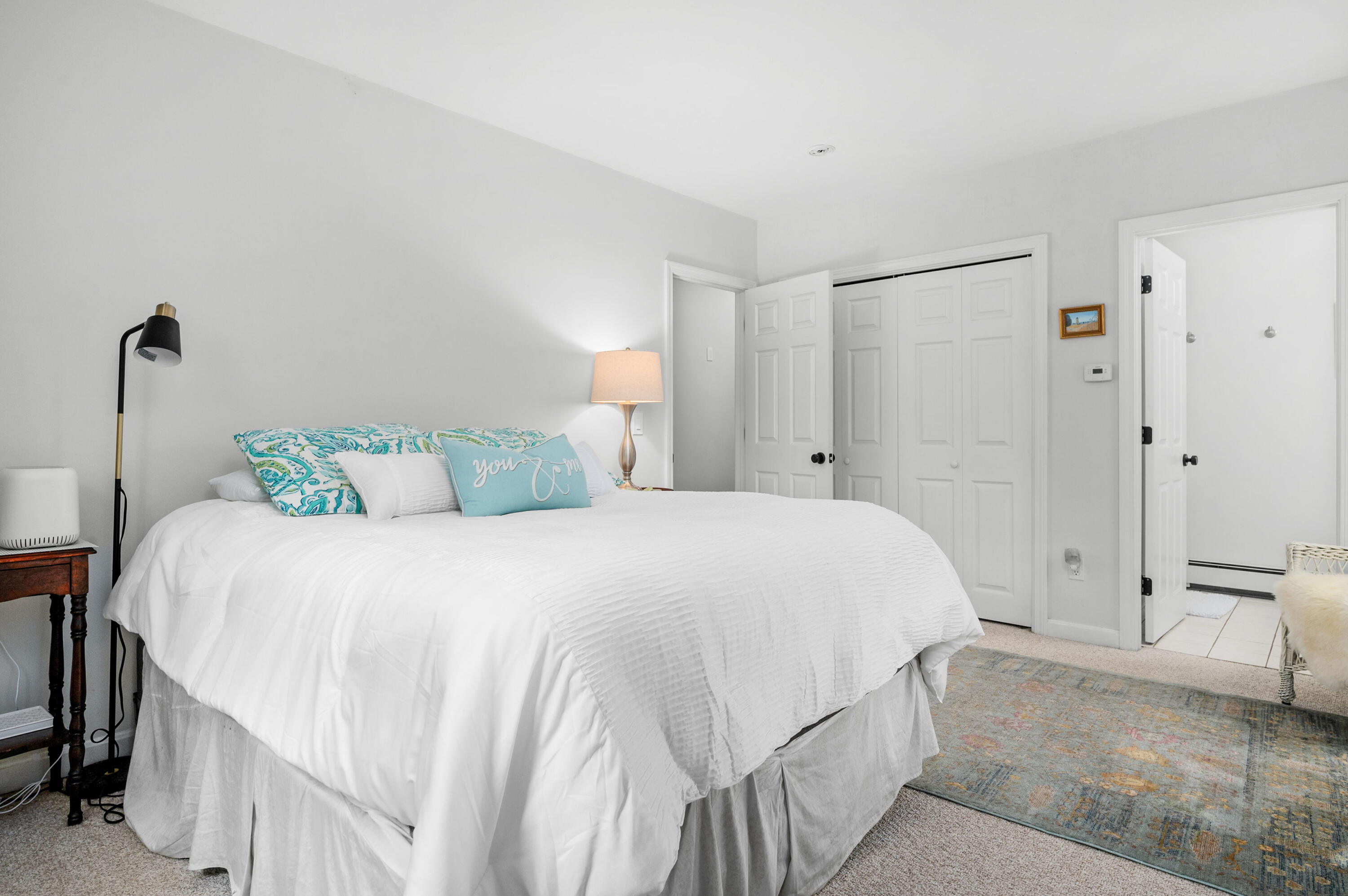 11 Quanset Road Orleans, MA 02653 - Photo 19 of 36 a bedroom with a bed and a painting