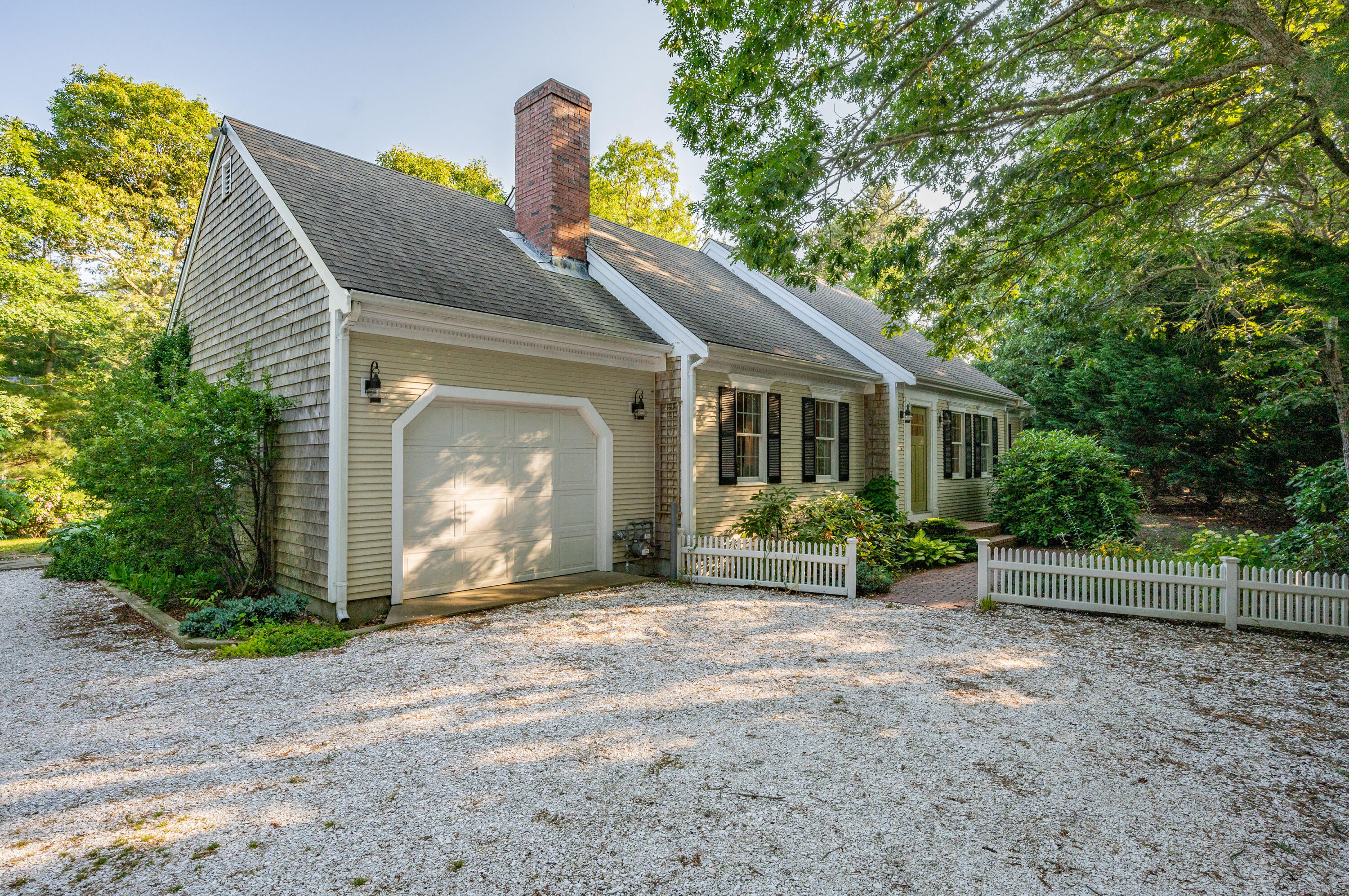 11 Quanset Road Orleans, MA 02653 - Photo 31 of 36 a front view of a house with a yard