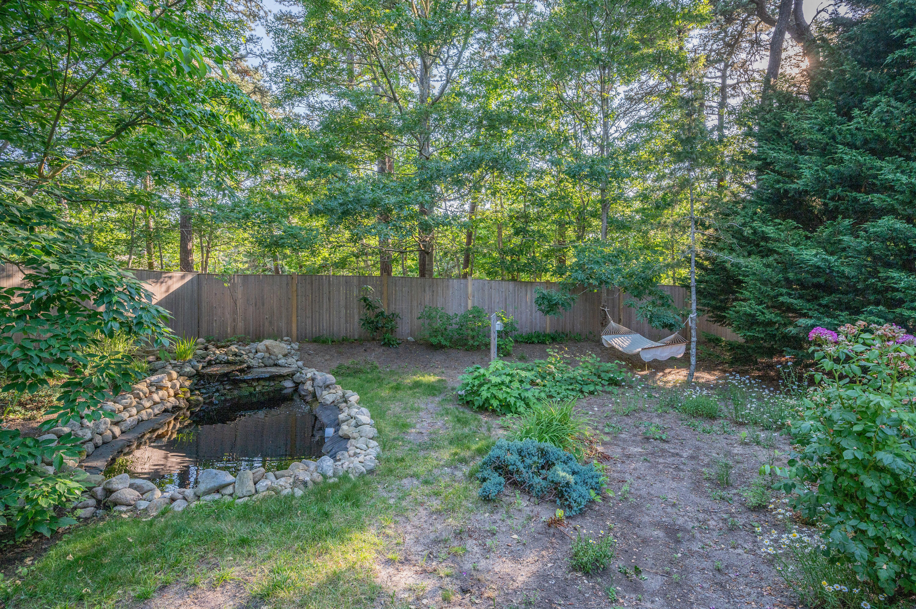 11 Quanset Road Orleans, MA 02653 - Photo 35 of 36 a view of a backyard