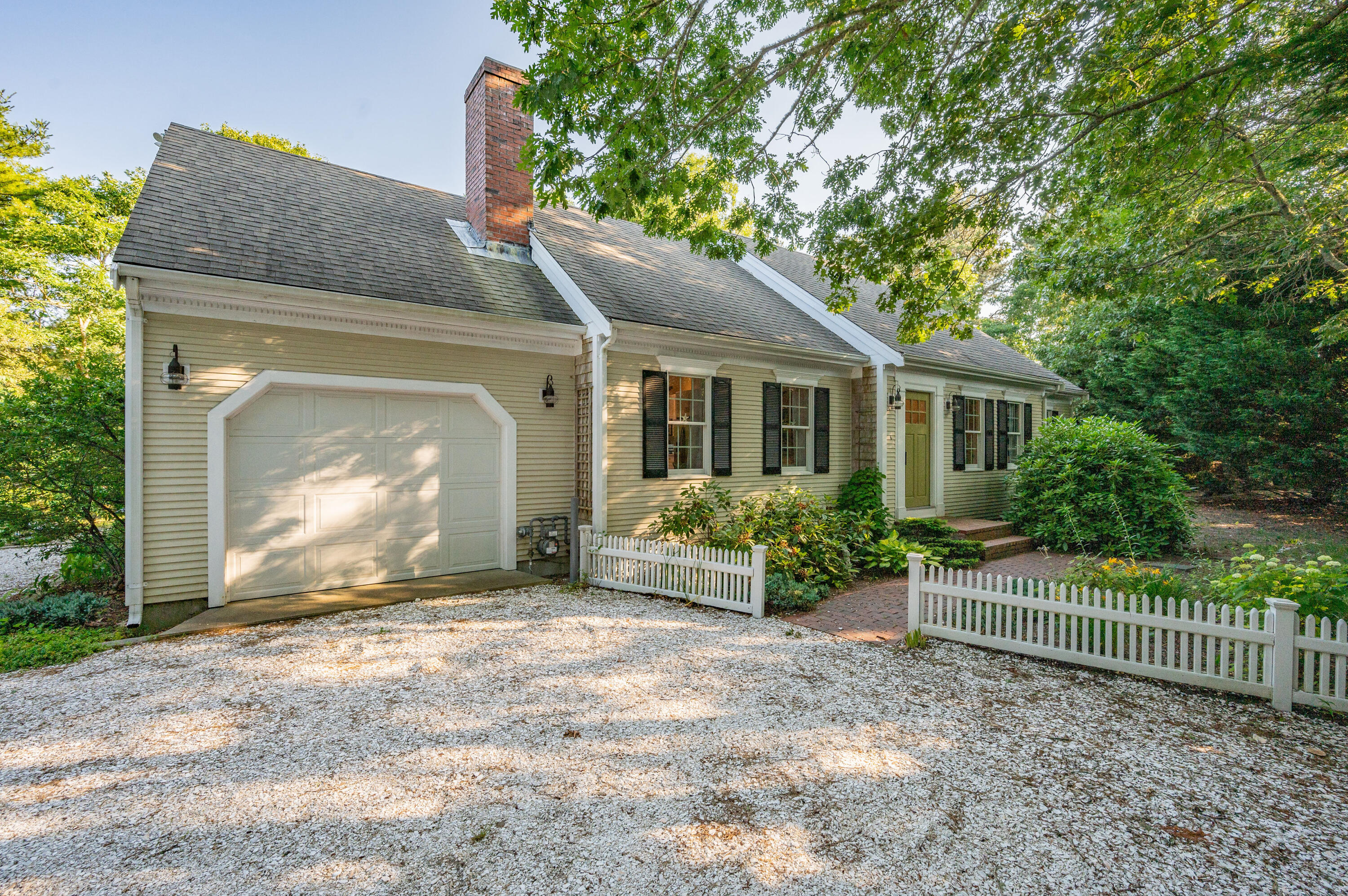 11 Quanset Road Orleans, MA 02653 - Photo 36 of 36 a front view of a house with a garden