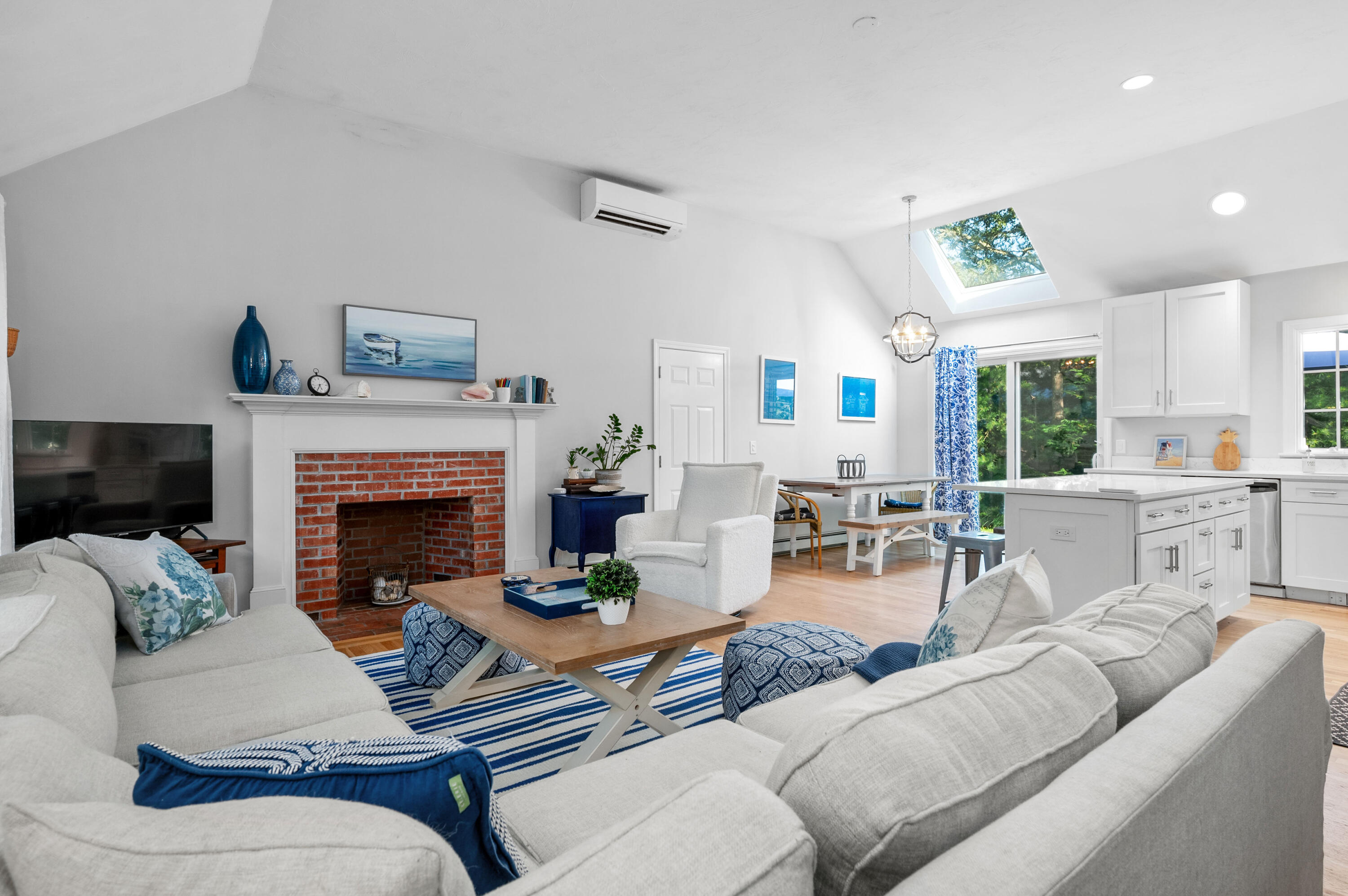 11 Quanset Road Orleans, MA 02653 - Photo 7 of 36 a living room with furniture and a fireplace