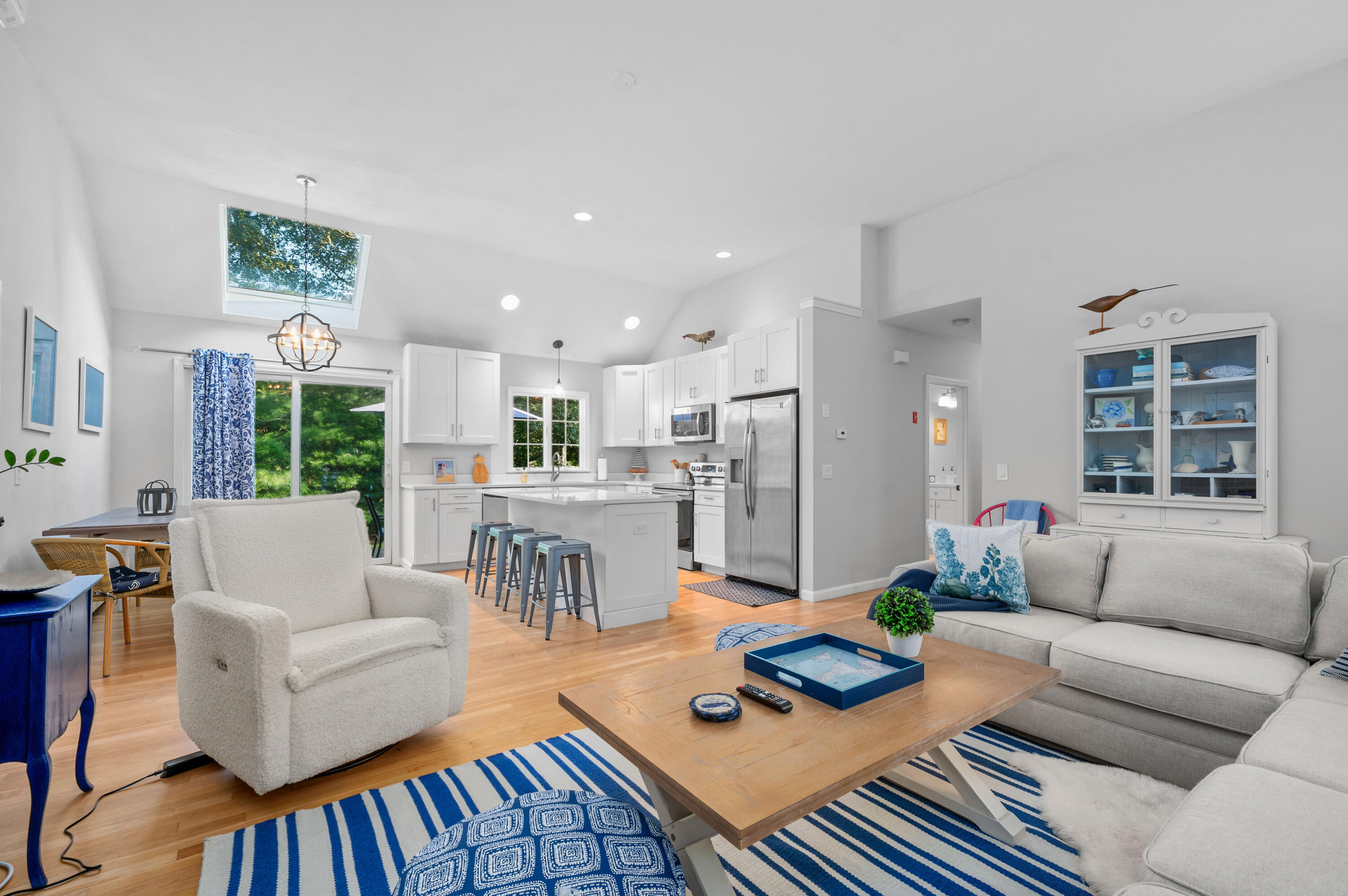 11 Quanset Road Orleans, MA 02653 - Photo 9 of 36 a living room with furniture and a table