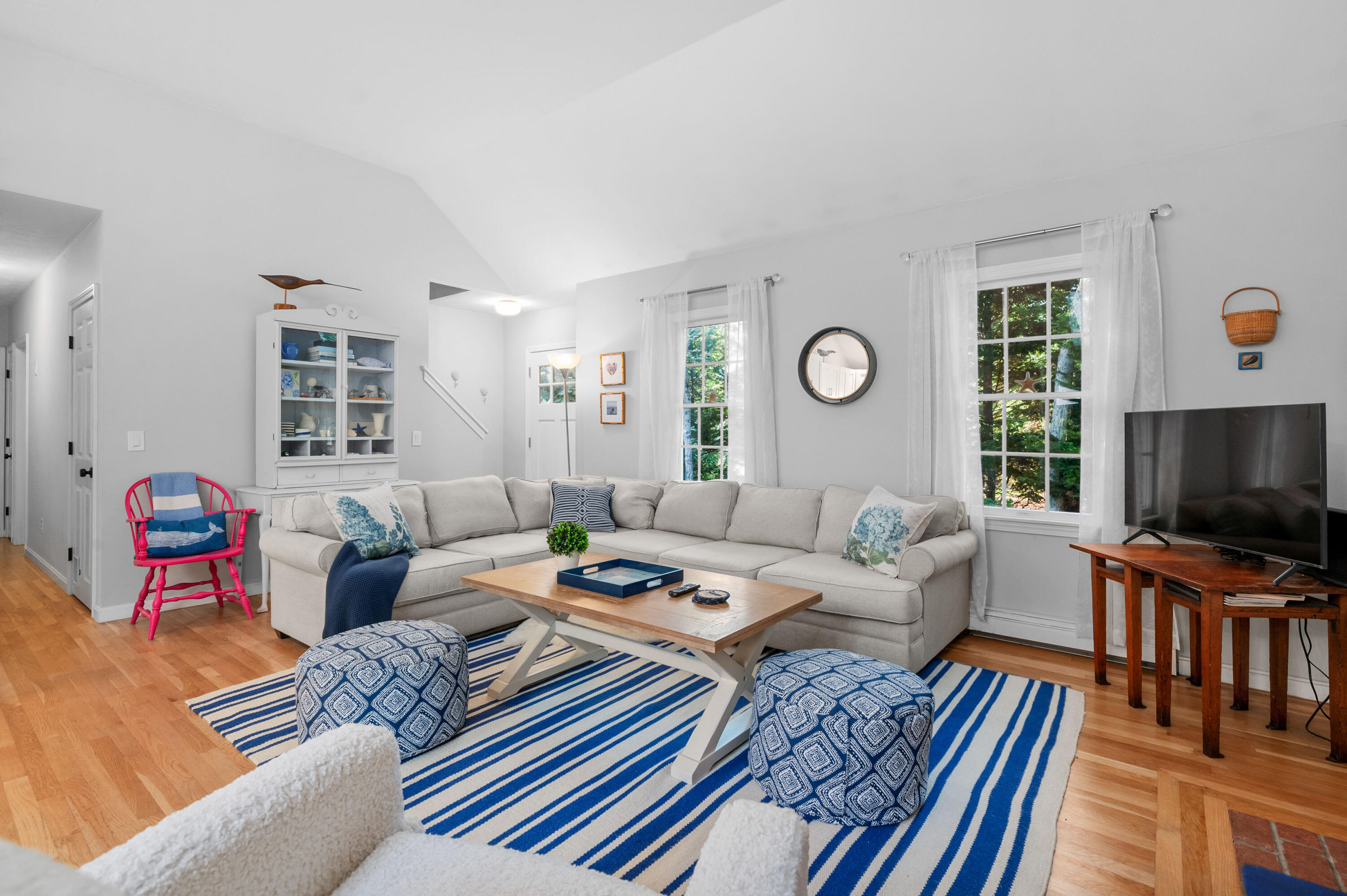 11 Quanset Road Orleans, MA 02653 - Photo 10 of 36 a living room with furniture and a flat screen tv