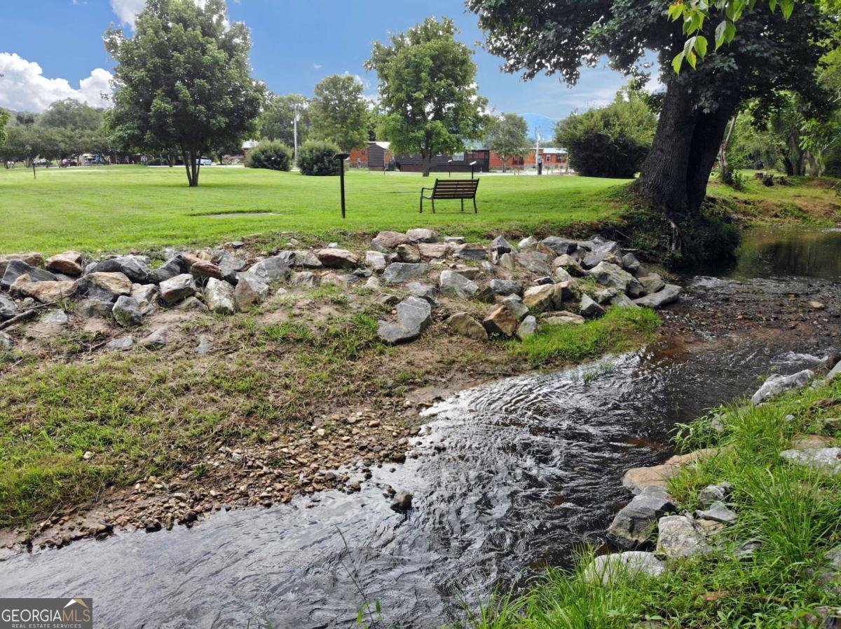 278 Foggy Mountain Road Blairsville, GA 30512 - Photo 25 of 31 a view of a golf course with a trees