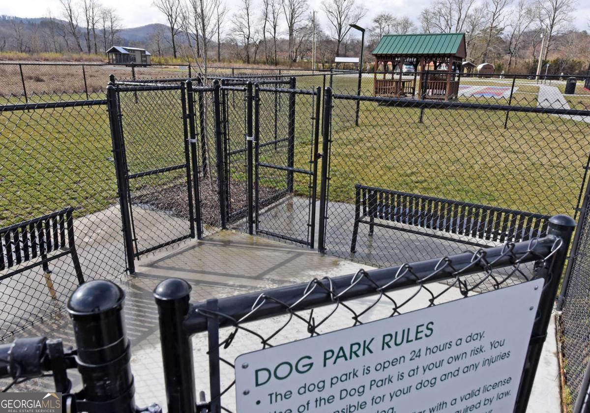 278 Foggy Mountain Road Blairsville, GA 30512 - Photo 31 of 31 a terrace with outdoor seating and city view