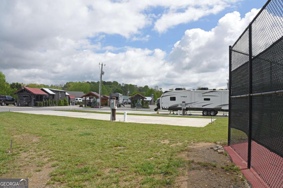 278 Foggy Mountain Road Blairsville, GA 30512 - Photo 6 of 31 a view of a lake with a big yard