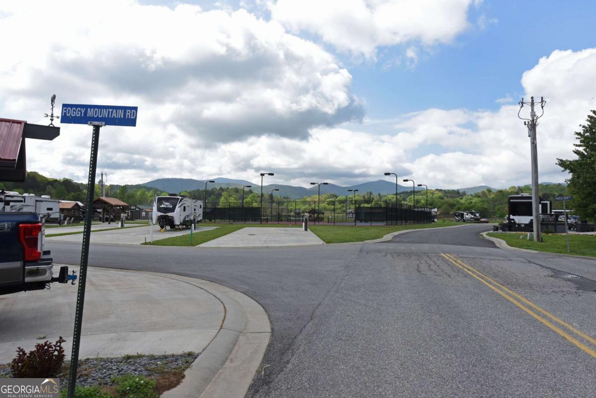 278 Foggy Mountain Road Blairsville, GA 30512 - Photo 9 of 31 a view of a city street with a building