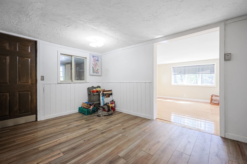 6 Hillside Road Holland, MA 01521 - Photo 8 of 27 a view of a room with wooden floor and a sink