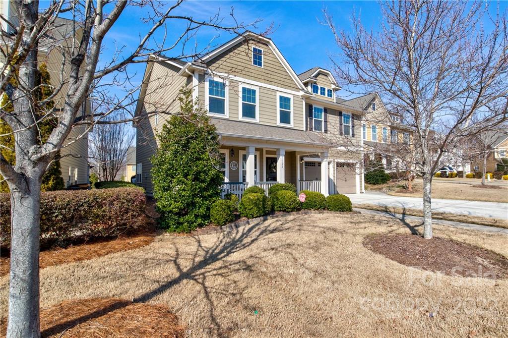 3022 Amaranth Drive Tega Cay, SC 29708 - Photo 3 of 33 a front view of a house with a yard