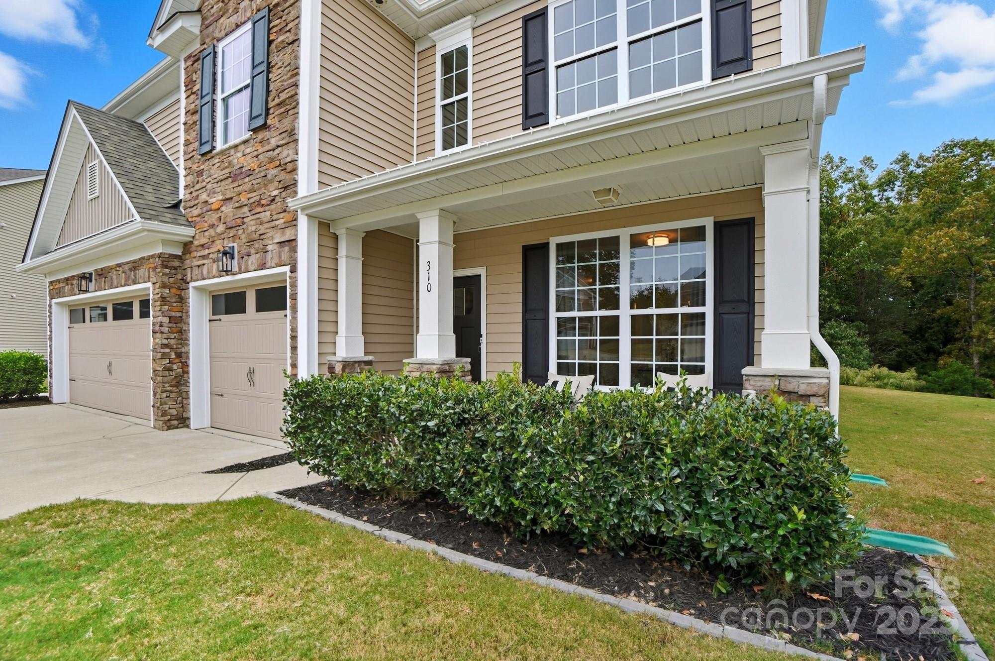 310 Annatto Way Fort Mill, SC 29708 - Photo 3 of 48 front view of a house with a yard
