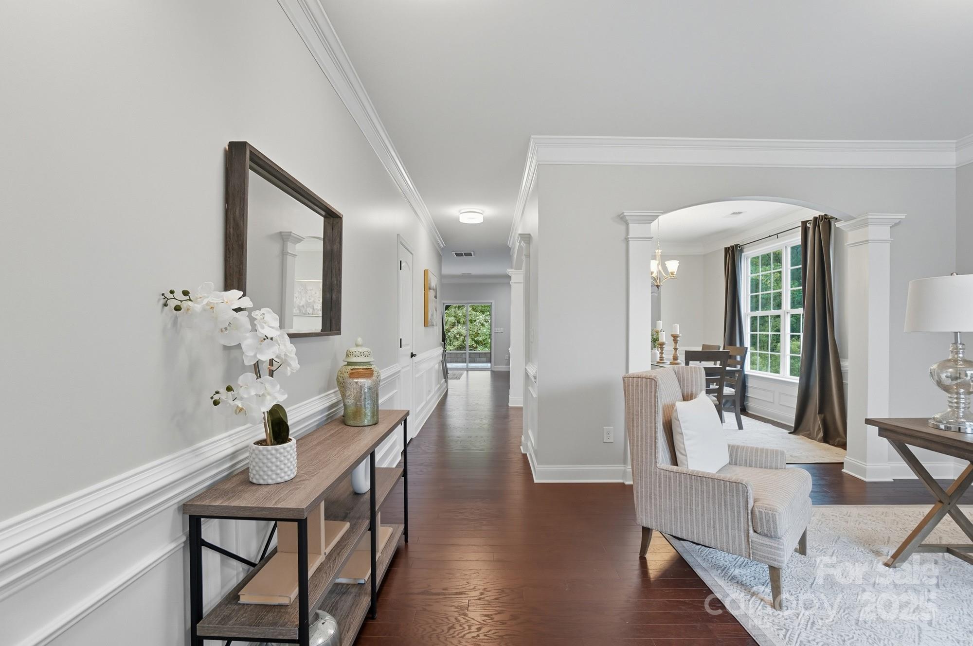 310 Annatto Way Fort Mill, SC 29708 - Photo 6 of 48 a view of a dining room with furniture and wooden floor